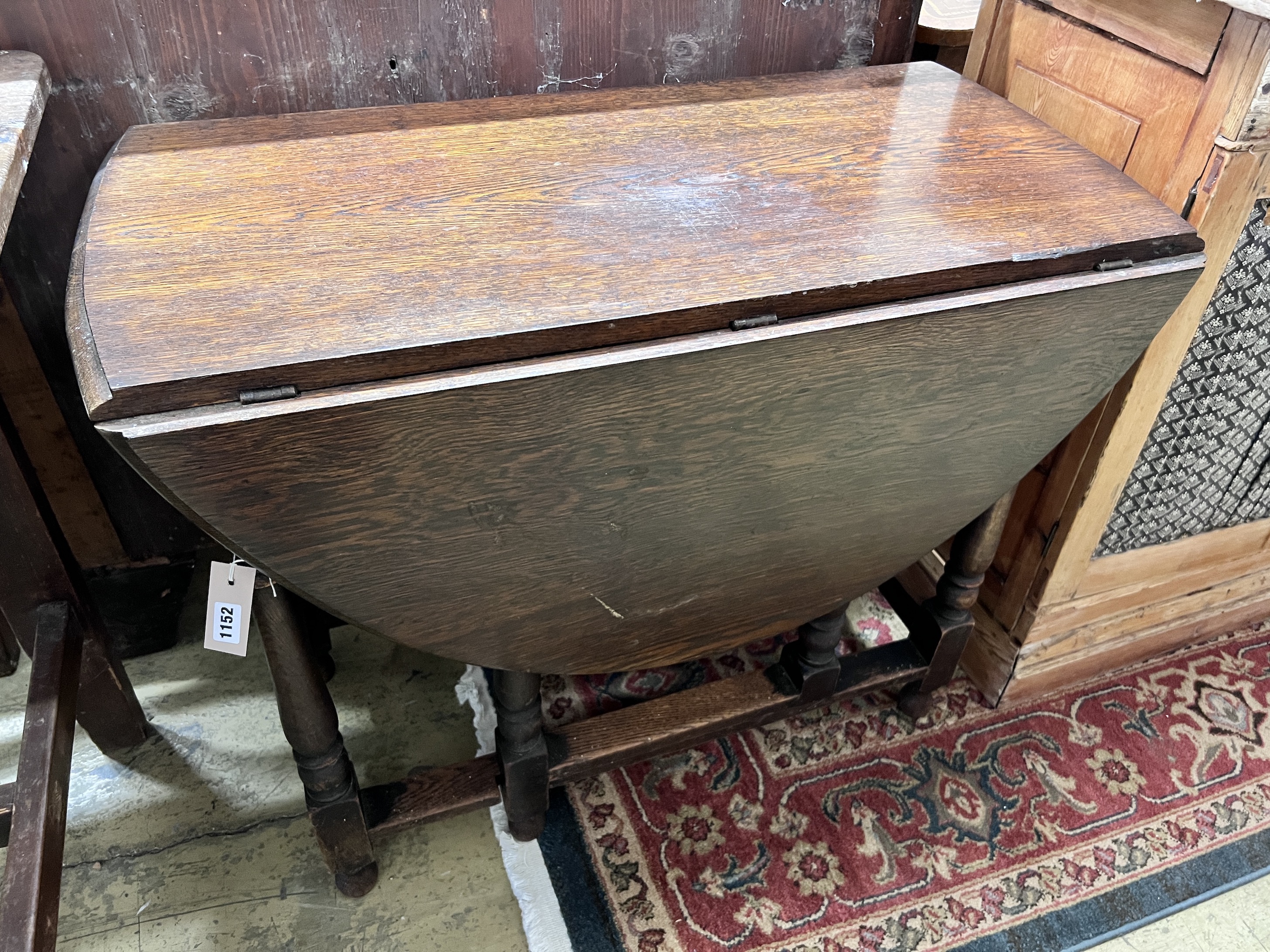 An 18th century and later oak gateleg table, width 90cm